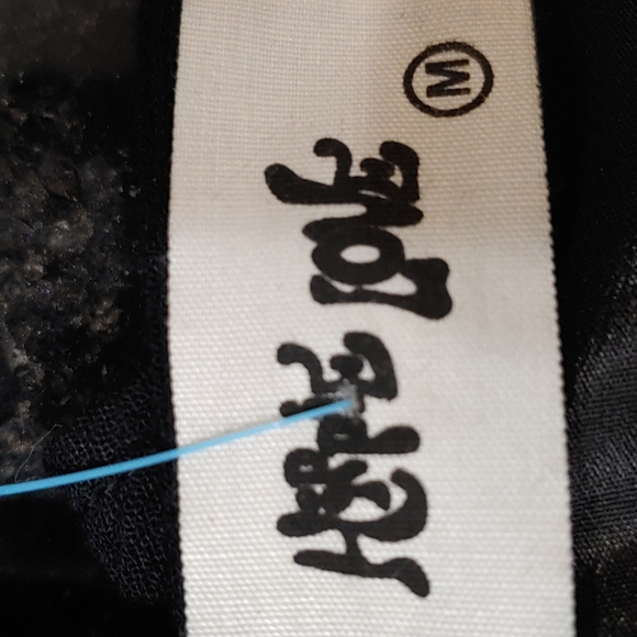 A Hippie Love LBD with cutouts and silver chain detail from Vanilla Sky Medium - Picture 8 of 11